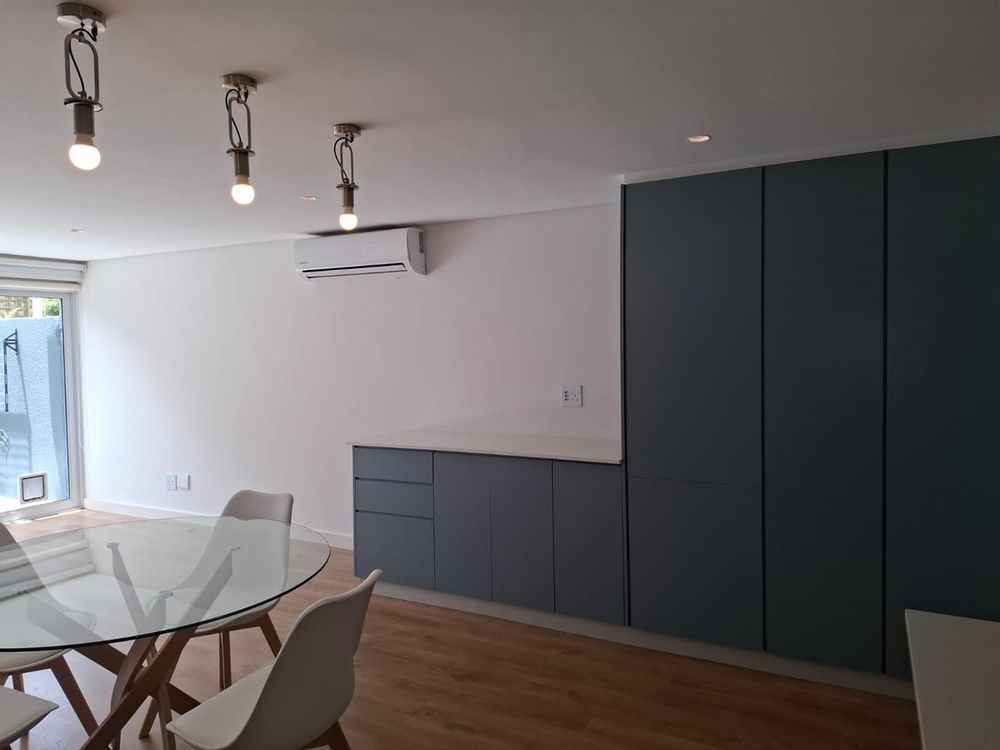 integrated fridge and built in cupboards 