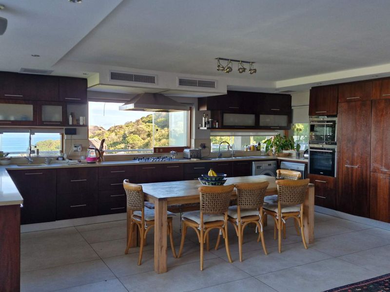 Exclusive Mountside Sanctuary: Breathtaking Chapman’s Peak, Valley & Ocean Views - Photo 9