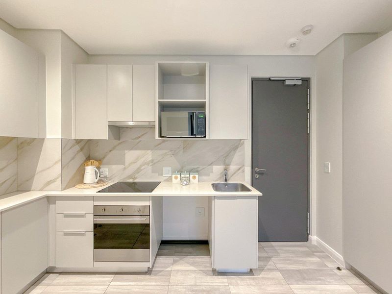 Luxurious Fully Furnished 2-Bedroom, 2-Bathroom Apartment with Two Lounges | The Capital Trilogy, Menlyn Maine - Photo 7