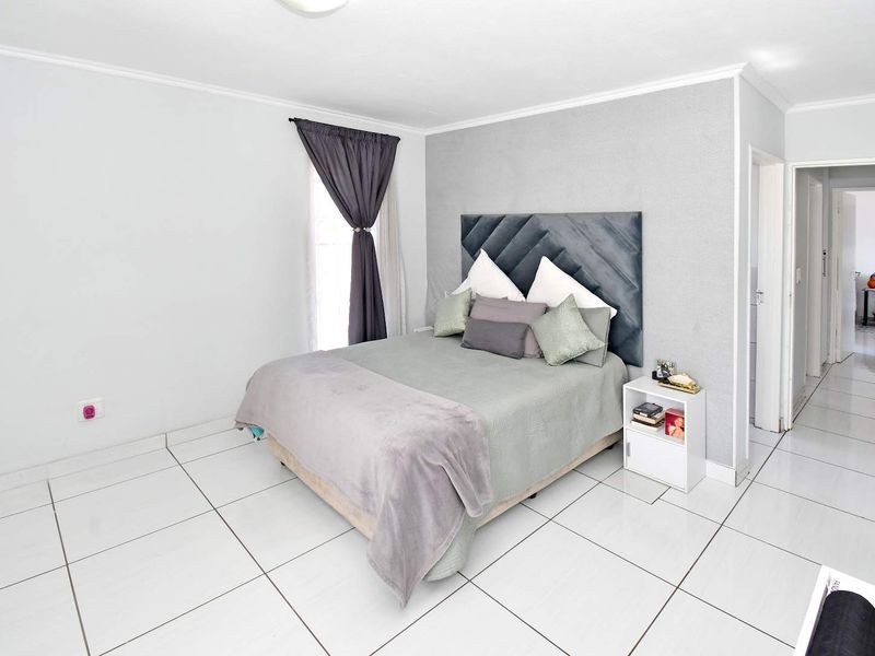 Light-Filled Living with Peaceful Green Views in a Secure Estate - Photo 9