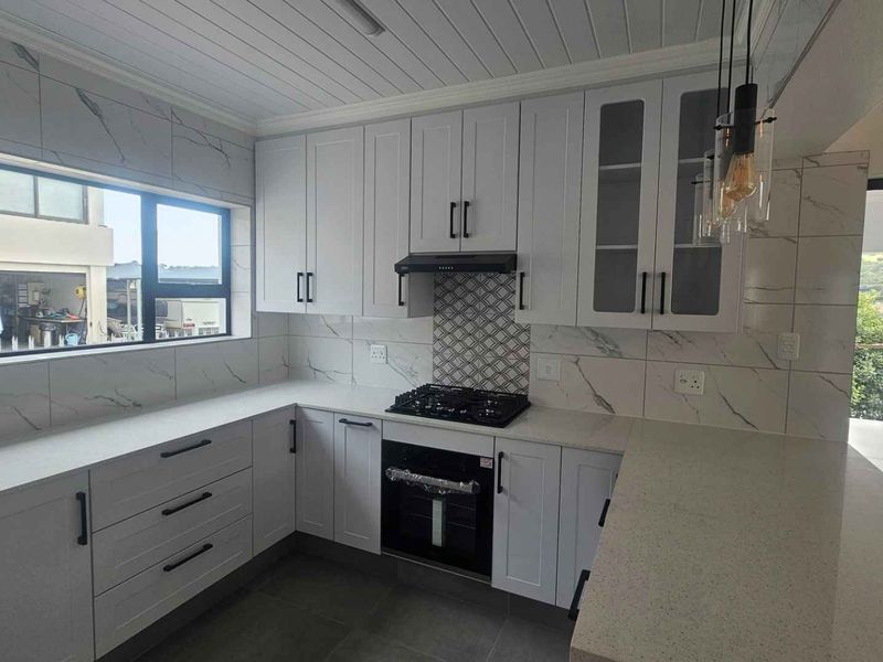 Modern Coastal Masterpiece with Breathtaking Views and Dual Entertainment Areas - Photo 8