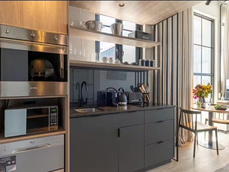 97% Airbnb Occupancy | Fully Furnished | Prime Zonnebloem Investment - Photo 3