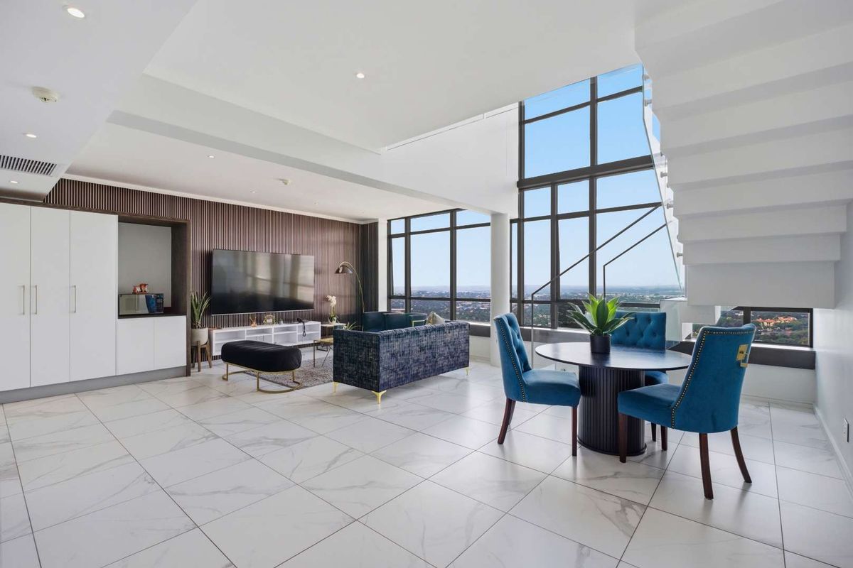 Sky-High Living: Stunning Sandton Penthouse with Panoramic Views - Photo 3