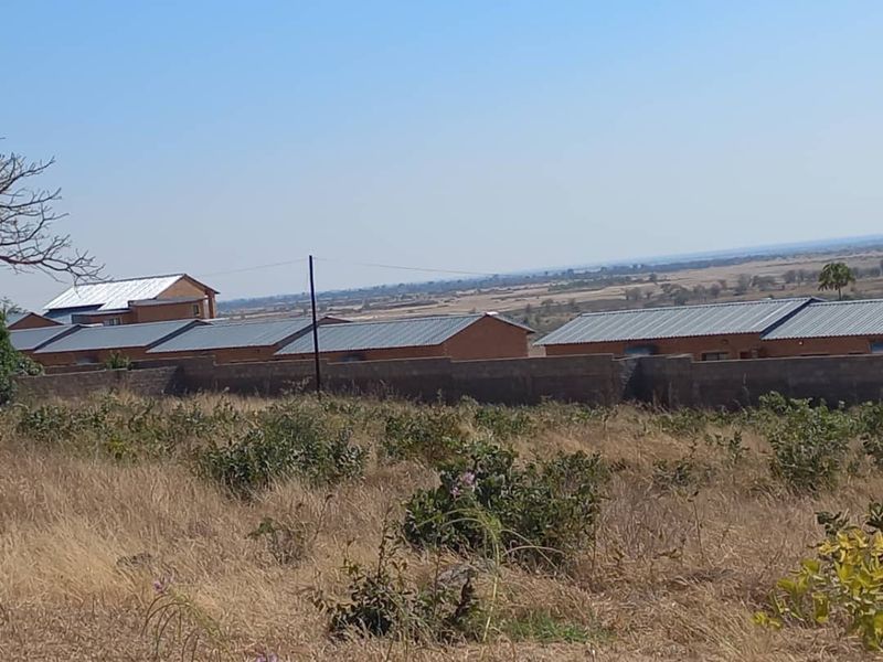 1 x 6 BEDROOM DOUBLE-STOREY HOUSE & 8 x 2 BEDROOM FLATS FOR SALE IN RUNDU: - Photo 2