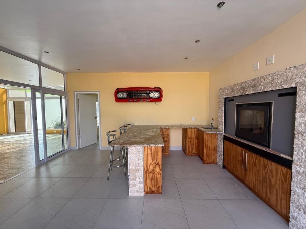 Entertainment area, and fireplace