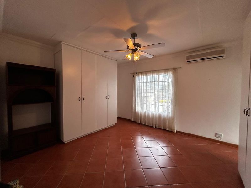 OFFERS WELCOME! Move-In Ready Gem: Spacious 3-Bedroom in Secure Village! - Photo 9