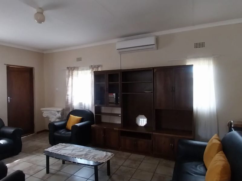 Versatile 3-Bedroom Property with 2-Bedroom Flatlet and Business Potential - Photo 9