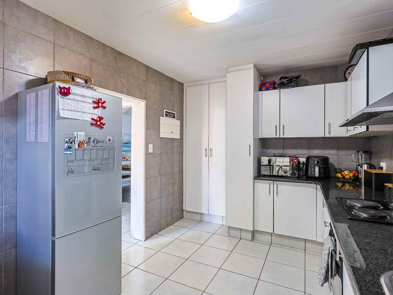 Move-In Ready Comfort | Secure, Renovated Living in the Heart of Constantia Park - Photo 9