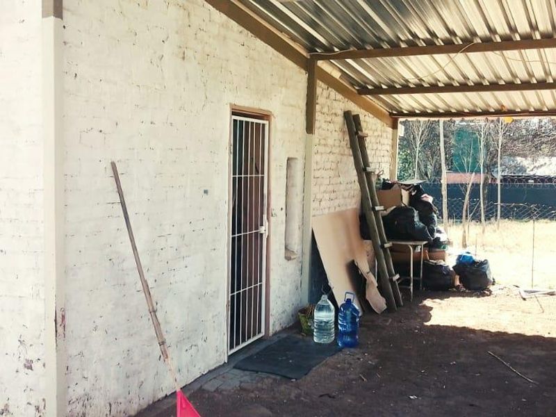 SMALL HOLDING .TWO FLATLETS.STRONG WATER. TWO BOREHOLES.SAVE AREA.CAN BUILD EASY 6 HOUSES. - Photo 7