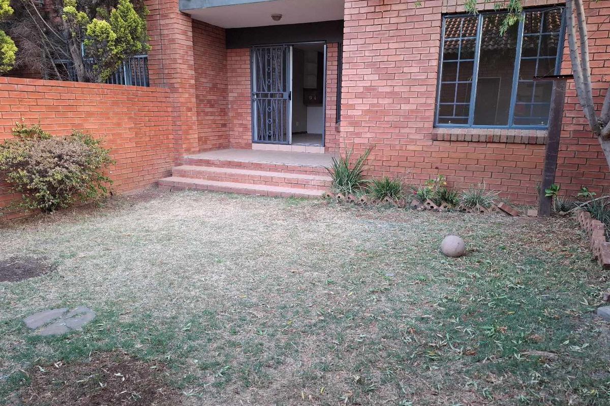 Two Bedroom Ground Floor Unit in Secure Complex - Photo 2