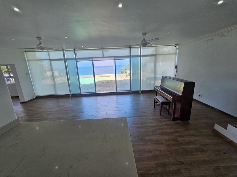 Sun-Soaked Modern Home with 5 Bedrooms &amp; Jaw-Dropping Sea Views - Photo 4