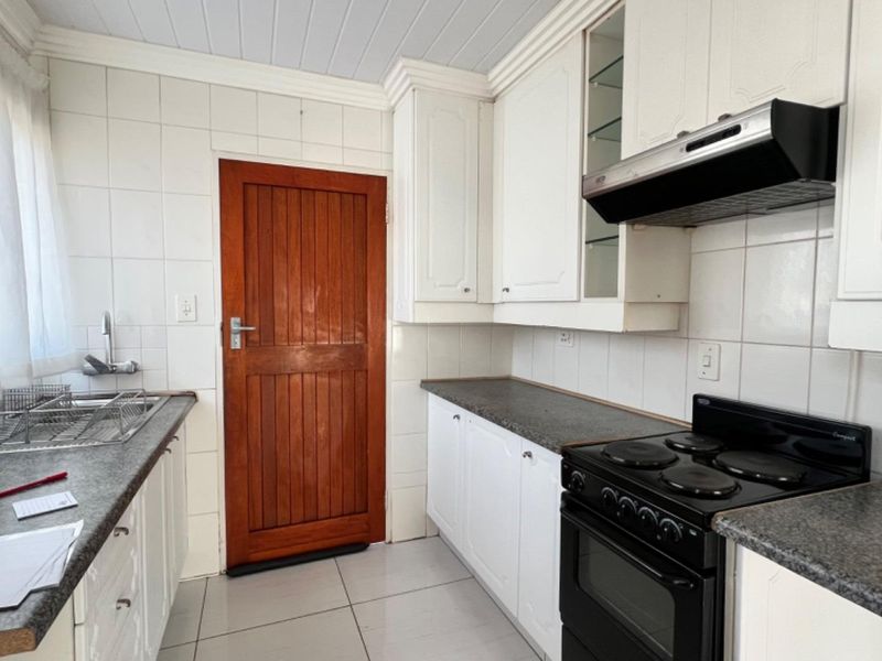Cook, Relax, and Feel Safe in This Stunning 2-Bedroom Home - Photo 5