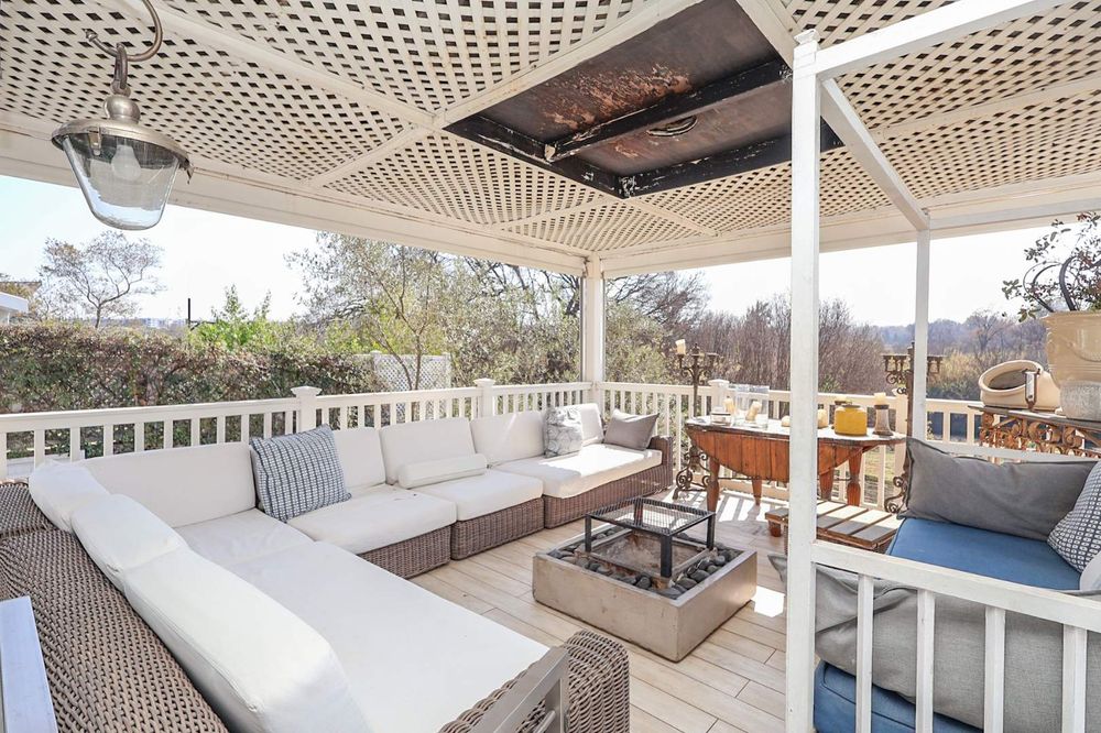 Patio with nature views and fire pit