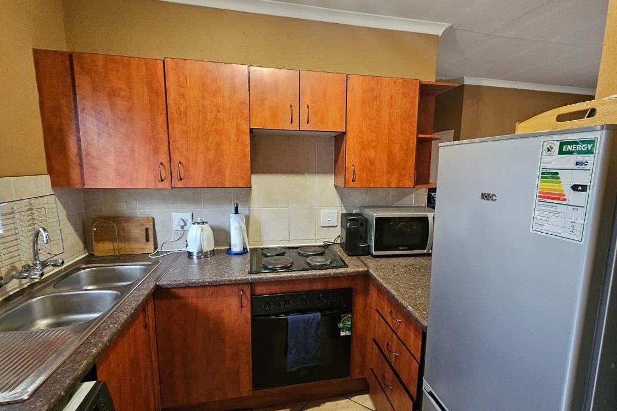 Affordable First-Floor Apartment with Balcony Braai & 24-Hour Security - Photo 3
