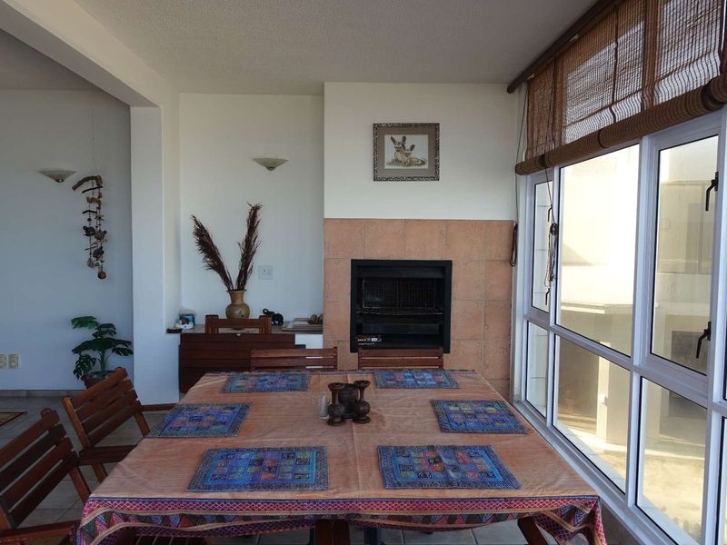 COASTAL ELEGANCE MEETS INVESTMENT OPPORTUNITY - Photo 3