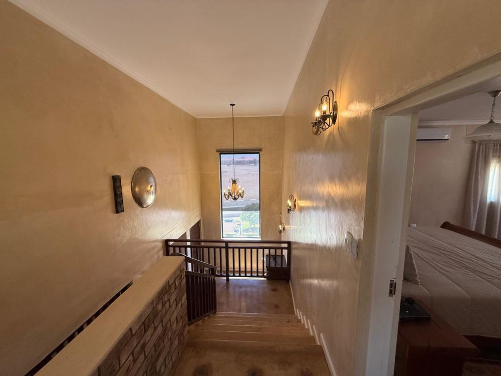 Stairway and main bedroom