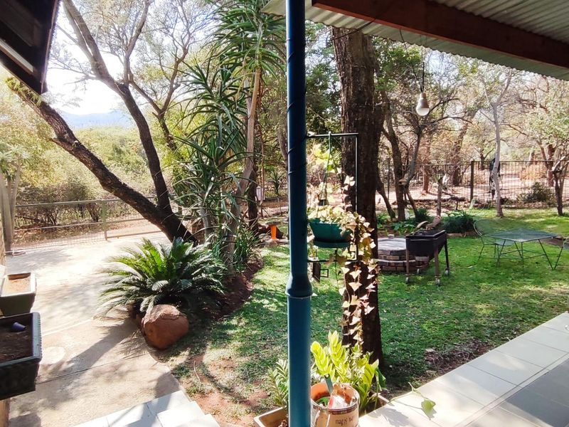 Charming Sunlit Home with Lush Garden in Prime Location - Photo 6