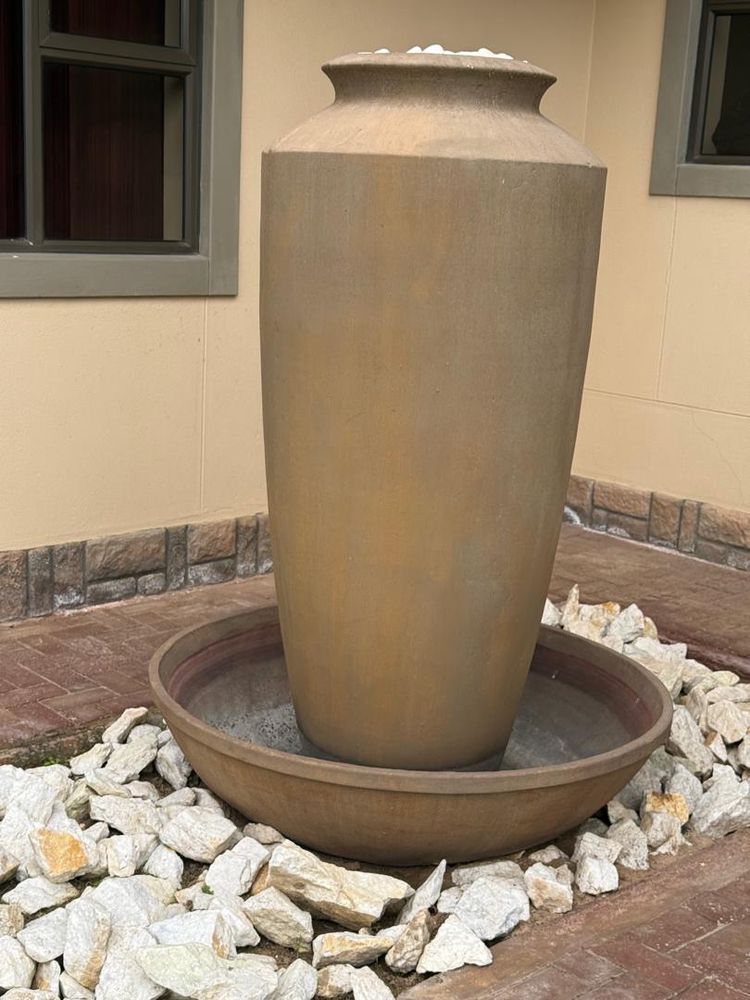 Sement pot in the garden