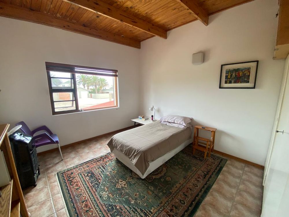 Flat one with a lounge, balcony, kitchen, bedroom and bathroom
