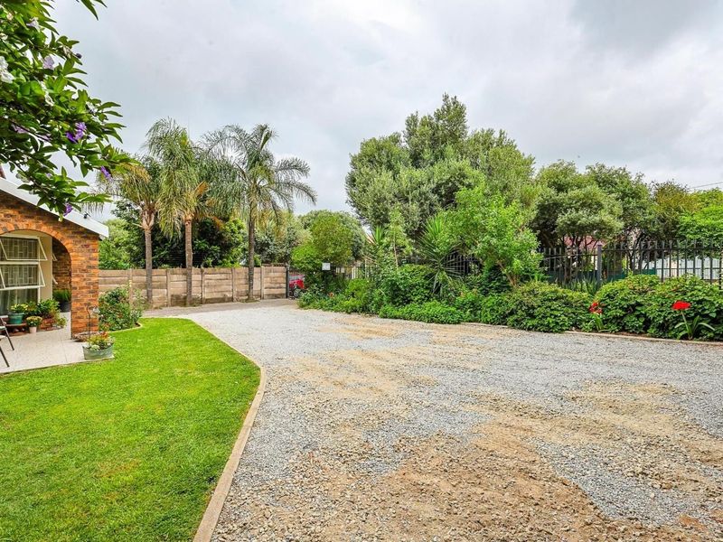Family Home with Flatlet, Solar Power, and Pool in Sought-After Rooihuiskraal - Photo 8