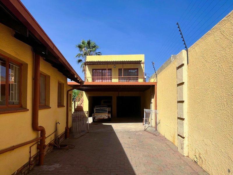 Spacious Family Home with Income-Generating Flatlet & Ample Parking in Prime Location - Photo 2