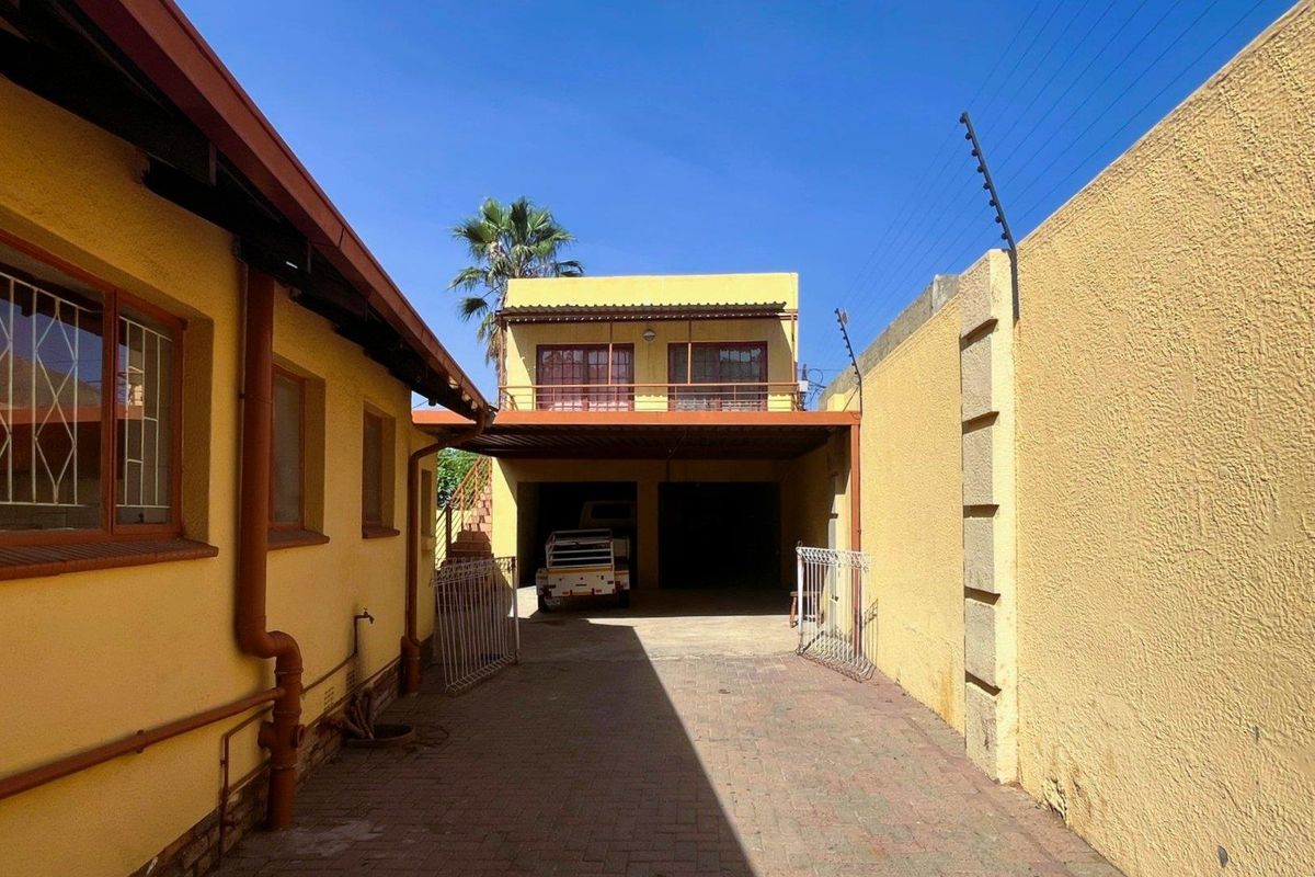 Spacious Family Home with Income-Generating Flatlet & Ample Parking in Prime Location - Photo 2