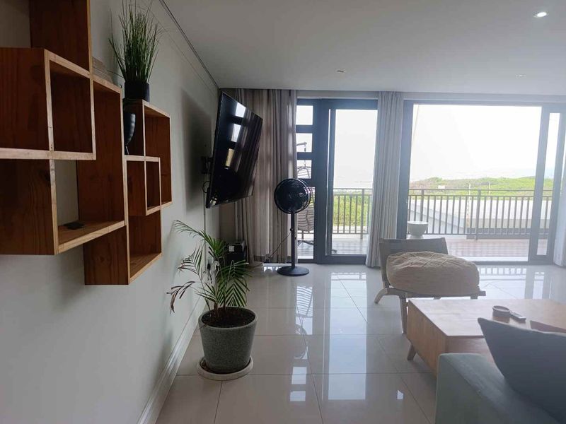 BEACHFRONT BLISS | FULLY FURNISHED 2-BEDROOM APARTMENT FOR RENT - Photo 2