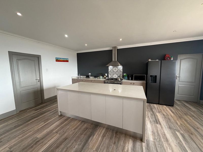 Modern Single-Level Cladded Brick Home with Ocean views - Photo 8