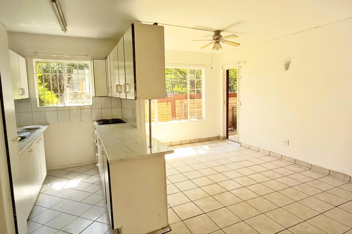 Charming Ground Floor Pet-Friendly Unit in Secure Complex - Photo 3