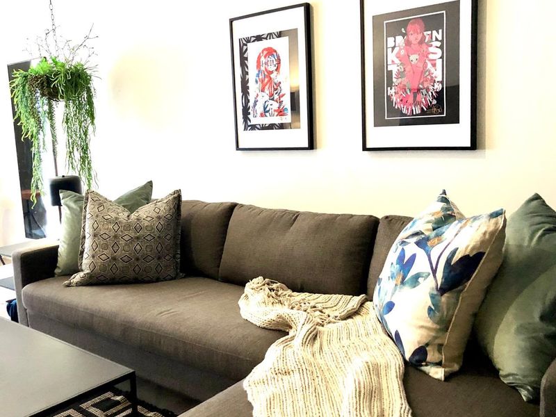 A comfortable living room area featuring neutral wall finishes and a well-maintained interior space.