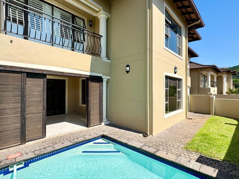 This spacious freestanding townhouse offers comfortable family living with excellent security and stylish finishes throughout. - Photo 2