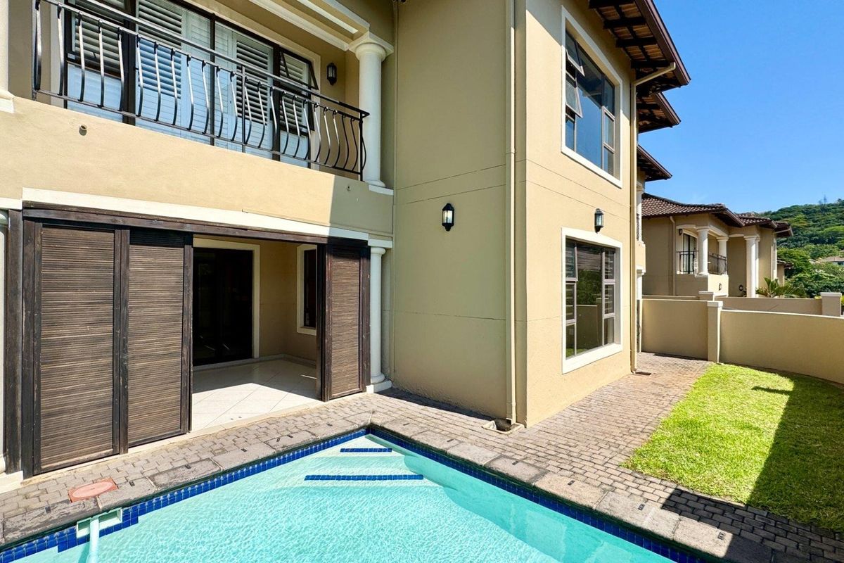This spacious freestanding townhouse offers comfortable family living with excellent security and stylish finishes throughout. - Photo 2