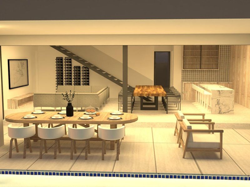An open-plan living and dining area featuring a modern kitchen island, staircase, and seamless transition to an outdoor patio and swimming pool.