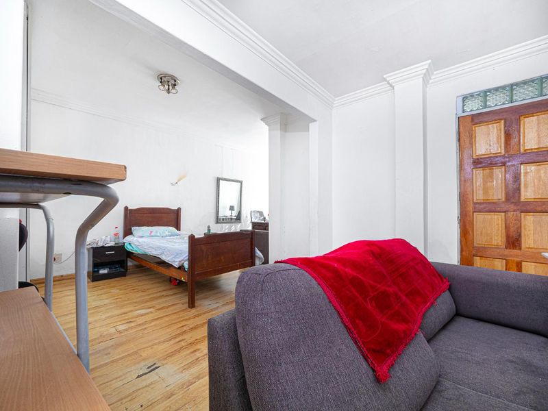 This Versatile Double-Storey property offers the perfect opportunity for renovation and customization with independent Upper and Lower Living (Homes) - Photo 5