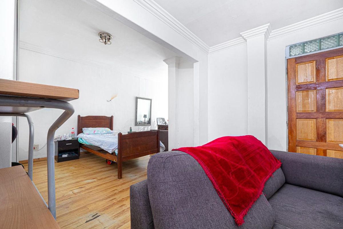 This Versatile Double-Storey property offers the perfect opportunity for renovation and customization with independent Upper and Lower Living (Homes) - Photo 5