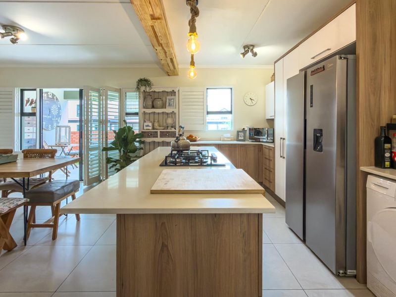 This home is ideal for young families, first time buyers, or anyone looking for a modern, move in ready property in one of Centurion most desirable estates. - Photo 6