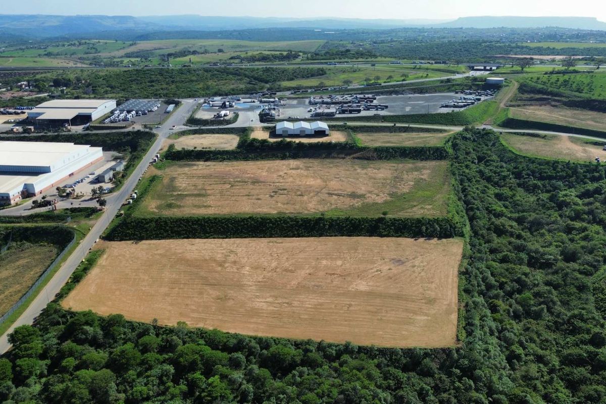 Aerial view of a large, cleared industrial land parcel situated within an established industrial precinct with direct road access.