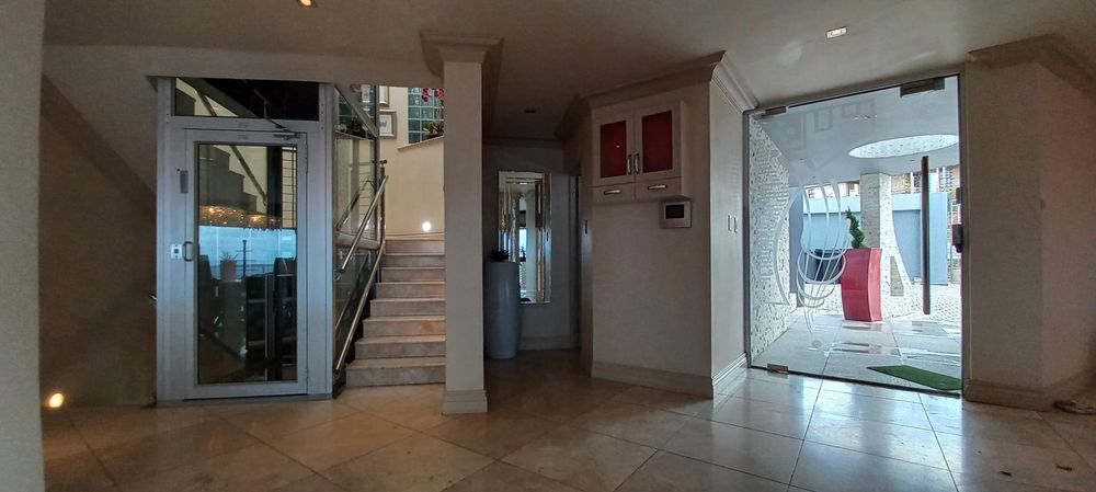 Front door, Guest WC and access to the lift