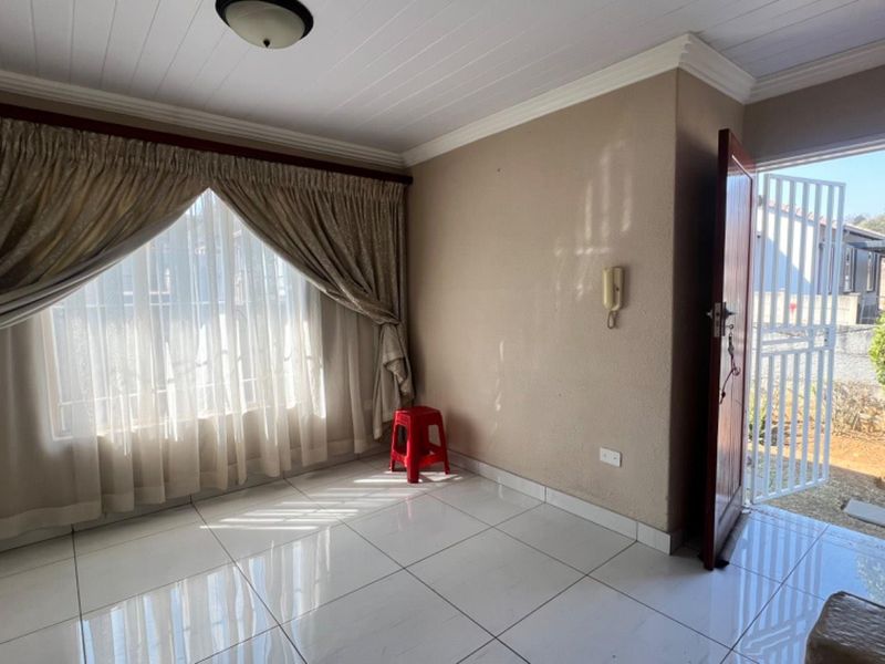 Cook, Relax, and Feel Safe in This Stunning 2-Bedroom Home - Photo 10