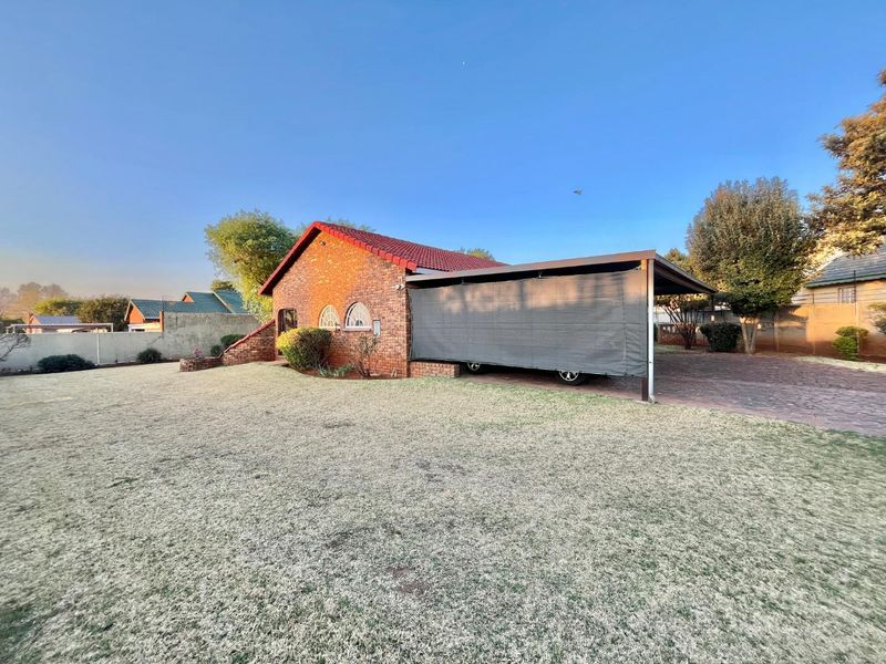 "Elegant Face Brick Home with Modern Security and Ample Parking! - Photo 8