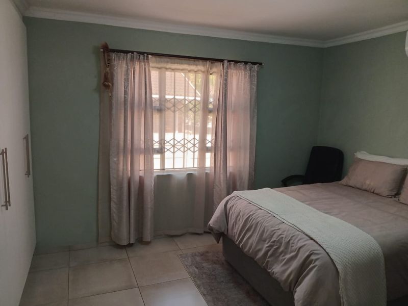 Step into comfort and modern convenience with this beautifully presented 3-bedroom home, perfectly designed for easy living. Fully tiled throughout, this home o - Photo 8