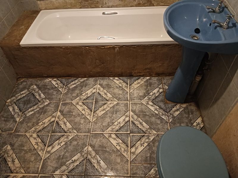 Live & Earn: 4-Bed Home + 9 Rented Units in Mahube Valley! - Photo 7