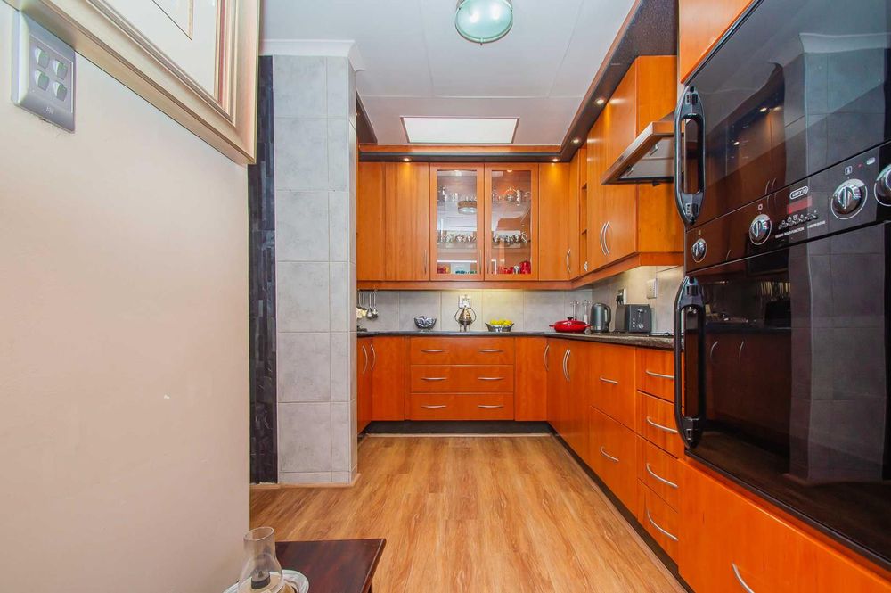 L-Shaped kitchen with backlit counters