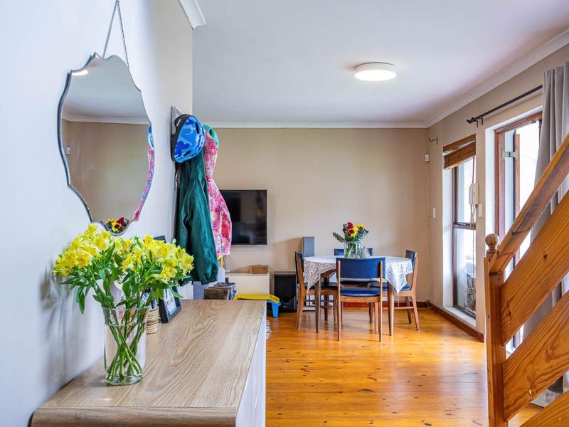 Charming North-Facing Double-Storey Home with Sunny Garden & Pool - Photo 9