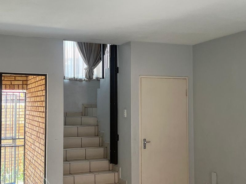 This lock up and go duplex unit is up for grabs in a lovely quiet security complex and facebrick as well. - Photo 6