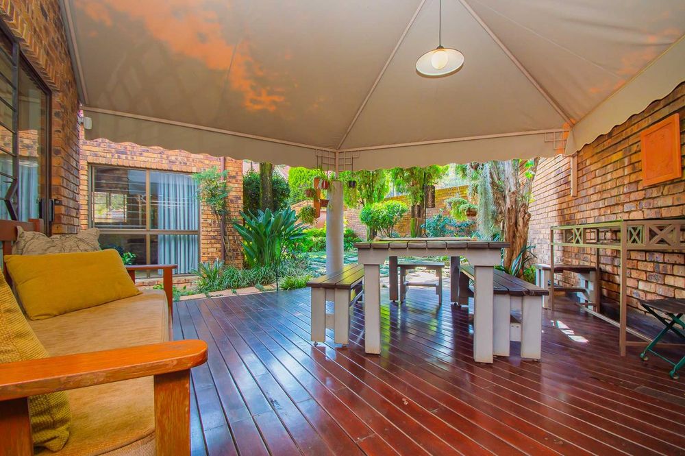 Decked canopied patio off dining room