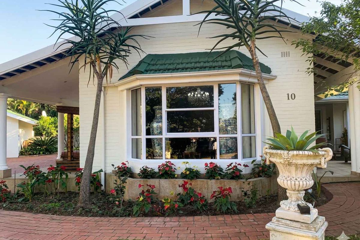 Elegant Estate Home Set on Expansive Grounds with Future Potential - Photo 2