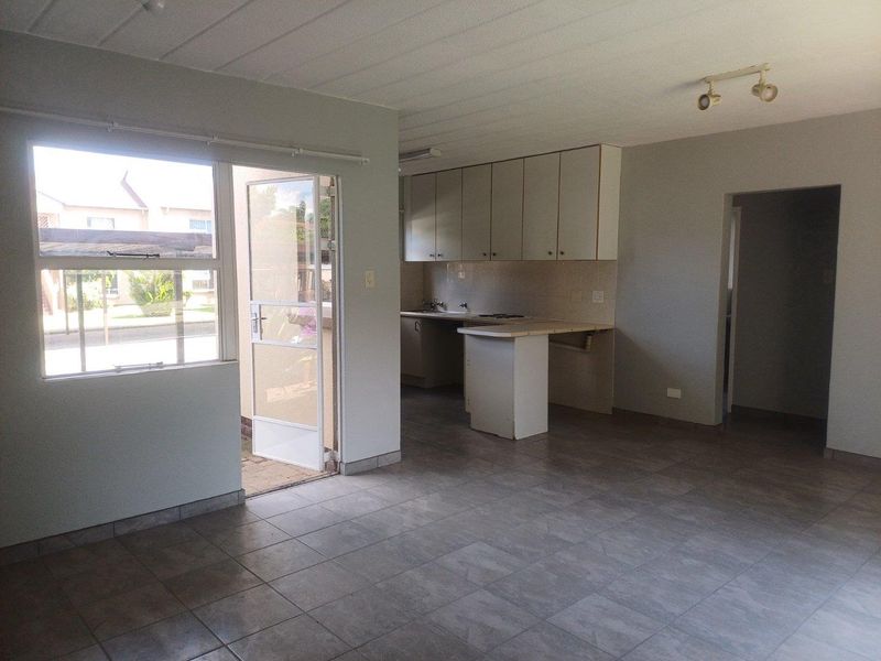 Secure Ground Floor Townhouse with Modern Comforts & Lifestyle Amenities - Photo 3