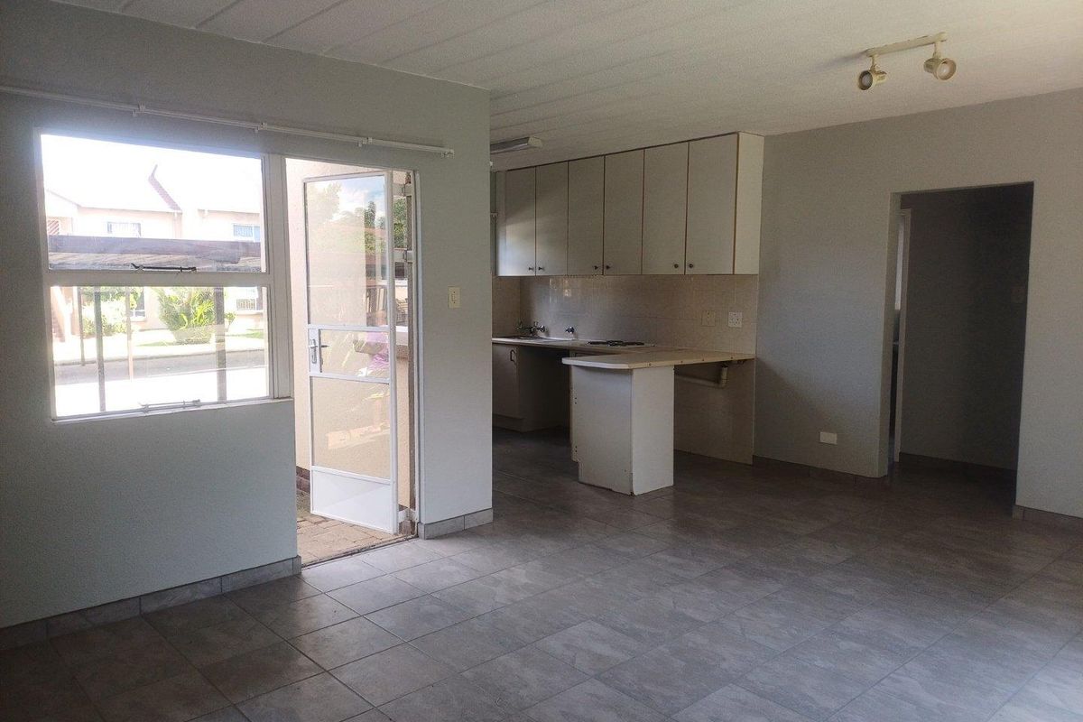 Secure Ground Floor Townhouse with Modern Comforts & Lifestyle Amenities - Photo 3