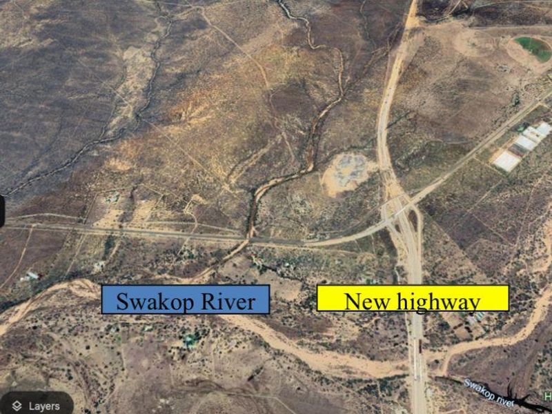 Aerial view of the property location showing the proximity to the Swakop River and the new highway infrastructure.